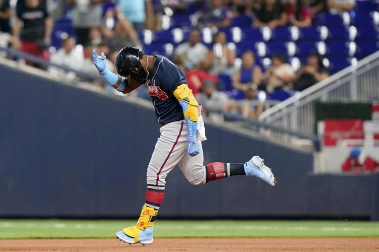 Ronald Acuna Jr. celebrates while running bases after home run