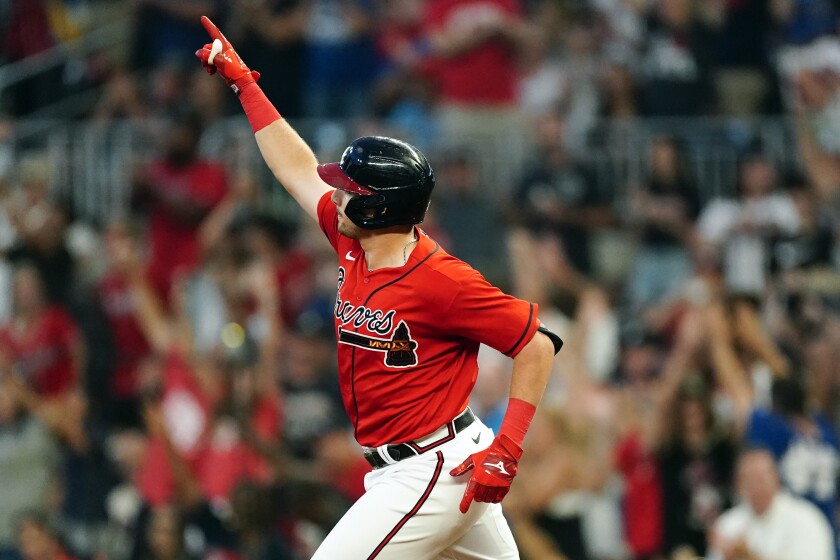Austin Riley celebrates a 3-run home run