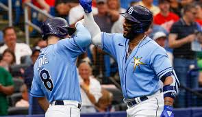 Rays celebrate during their 13th straight win of the season