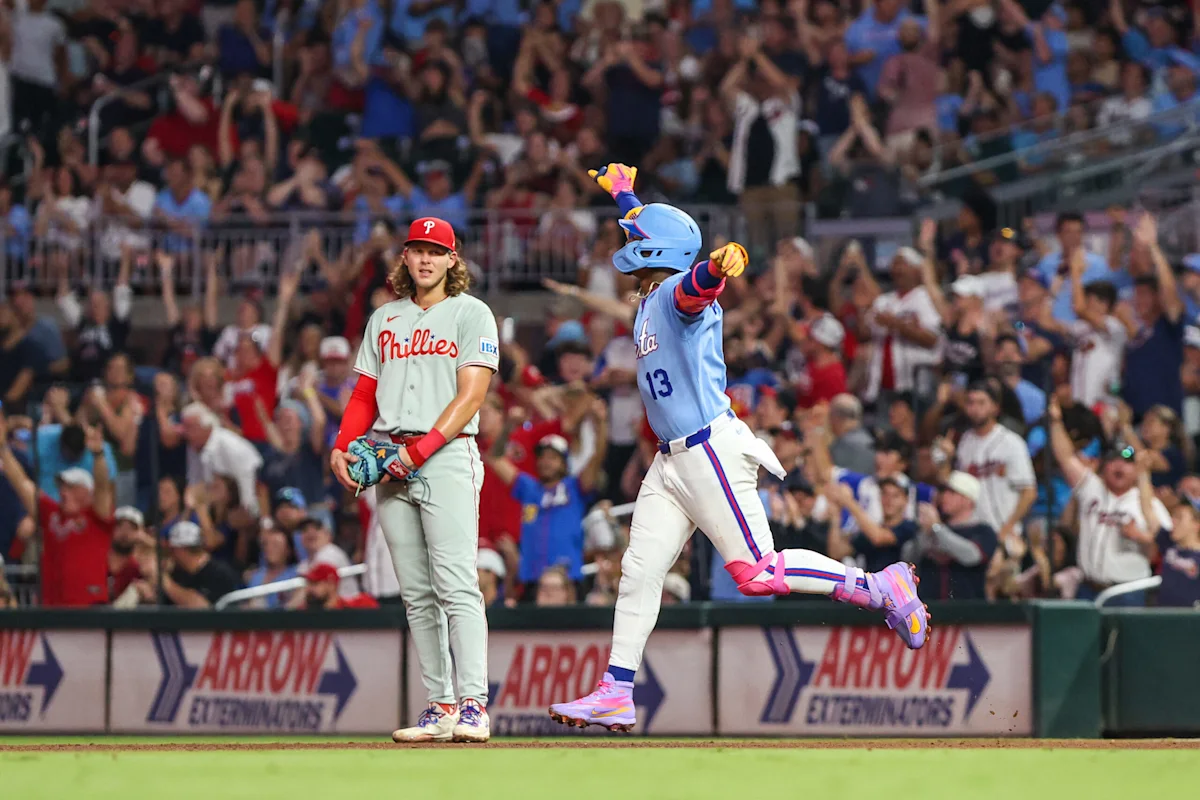 Ronald Acuna Jr. celebrates after hitting a home run