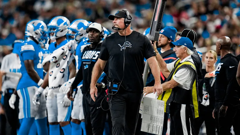 Lions head coach Dan Campbell looking serious